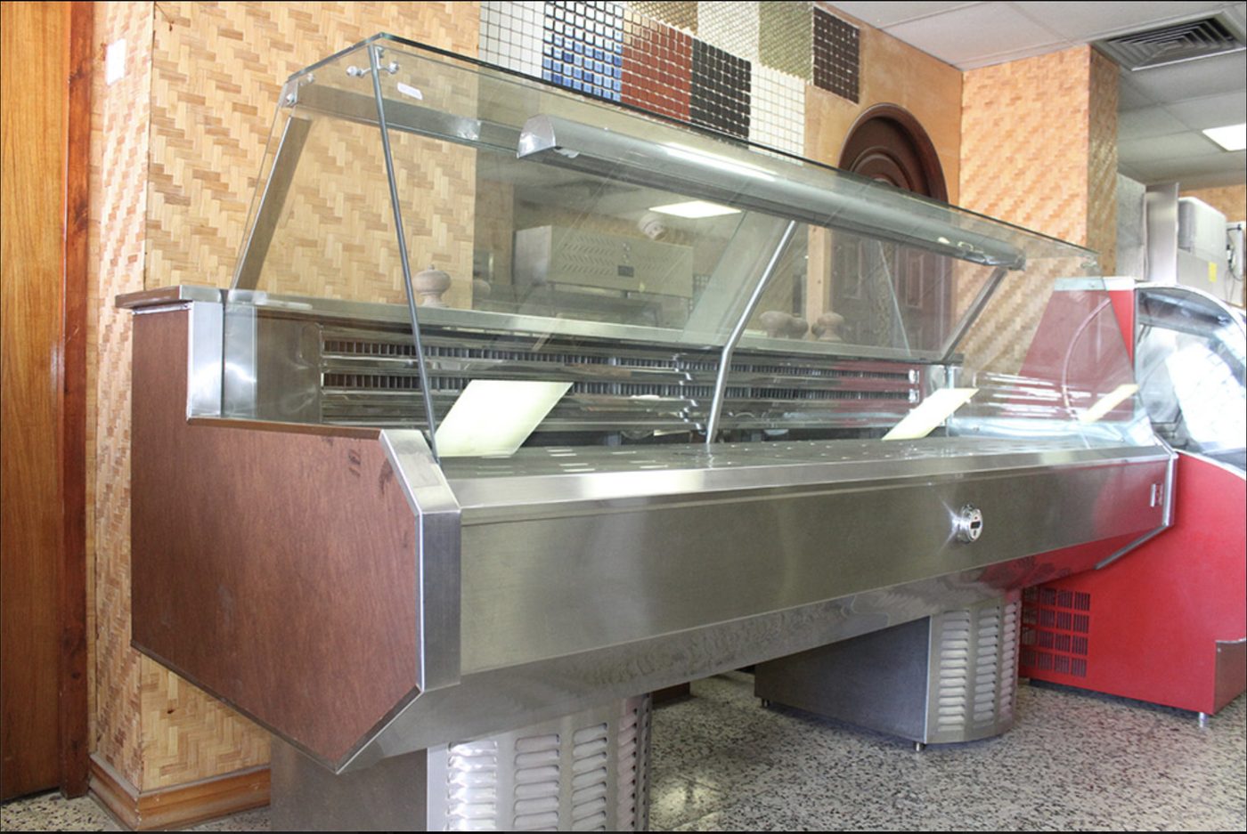 Stainless steel refrigerated glass display counter for a shop or bakery